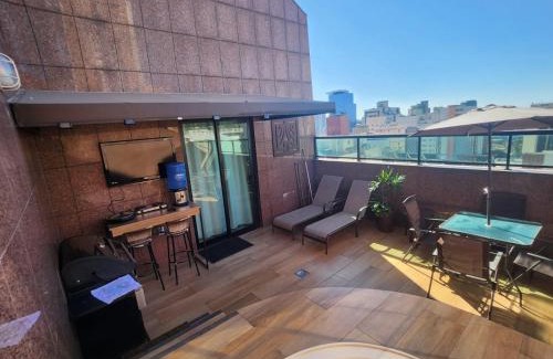 Savassi Apartment | Discover Condo Tower Cobertura 1503: Oceanfront Oasis