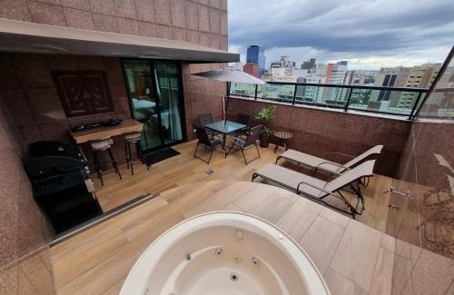 Savassi Apartment | Discover Condo Tower Cobertura 1503: Oceanfront Oasis