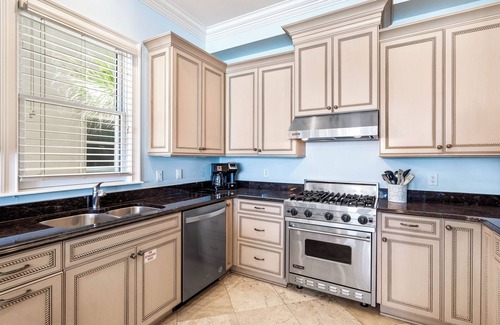 Delos House | Experience The Brookie: King Beds, Private Pool & Beach Access