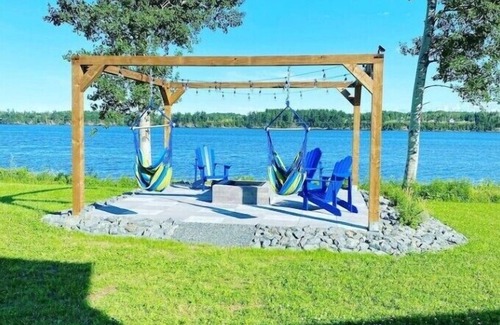 Miramichi House | Discover Saving Grace Waterfront Retreat: Pet-Friendly Haven