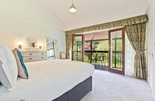 Penny Bridge House | Relax at Sawmill Cottage, Pet-Friendly Retreat by Coniston Water