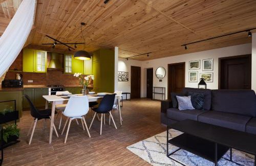 Kamenets-Podol'skiy Apartment | Inviting Scandinavian Hygge with Canyon View Lounge
