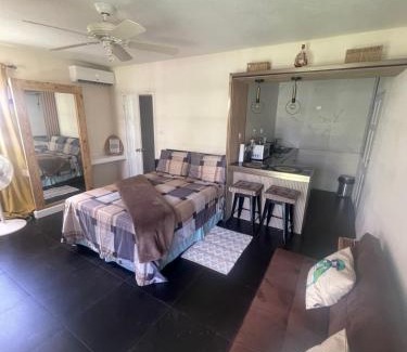 Haggatt Hall Apartment | Scarlett Studios: Prime Location Near US Embassy & Family-Friendly