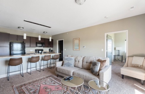 West Des Moines Apartment | Serene Forest Escape with Garage & Family-Friendly Amenities