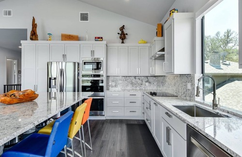 Spicewood House | Lake View Retreat: King Beds & Inviting Decks Await