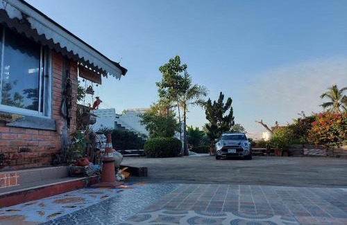 Kamphaeng Phet Resort | Serene Riverside Resort with Pool & Family-Friendly Amenities
