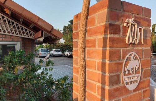 Kamphaeng Phet Resort | Serene Riverside Resort with Pool & Family-Friendly Amenities