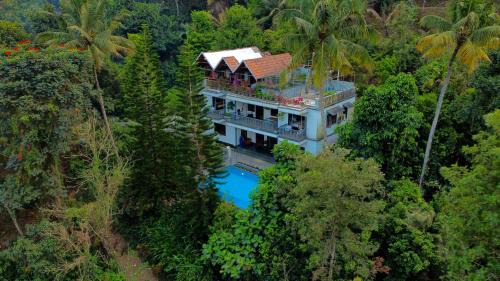 Devikolam House | Discover Sceva's Garden Home: Oceanfront Retreat with Pool