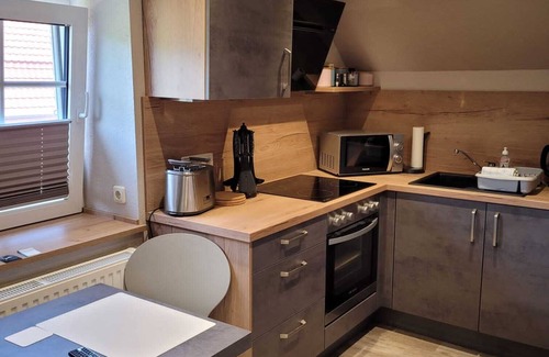 Krummhoern Apartment | Charming 1-Bedroom Retreat in Serene Countryside