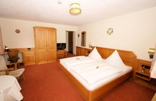 Haeusern Hotel | Oceanfront SchöpPerle: Family-Friendly Getaway Awaits