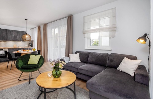 Groemitz Apartment | Cozy Oceanfront Apartment with Free Wi-Fi and Pool Access
