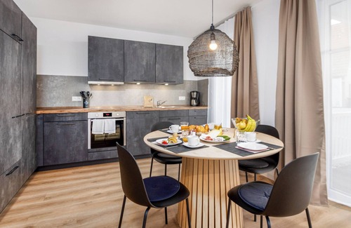 Groemitz Apartment | Cozy Oceanfront Apartment with Free Wi-Fi and Pool Access