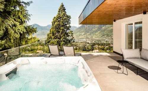 Schenna Apartment | Discover Schenna Chalet: Penthouse with Private Pool