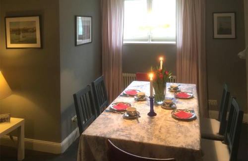 Gueby Apartment | Family-Friendly Schlei Ferienwohnung Country Garden Retreat