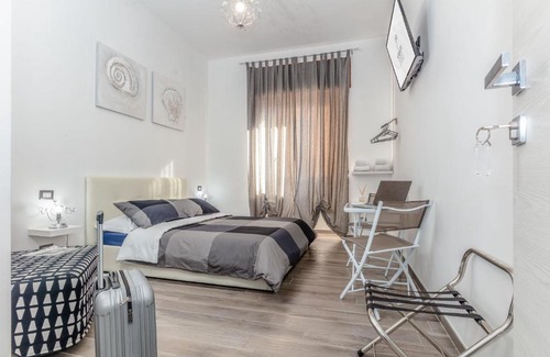 Civitavecchia House | Exceptional Scirocco Rooms: Family-Friendly & Accessible Stay