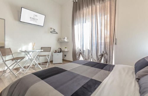 Civitavecchia House | Exceptional Scirocco Rooms: Family-Friendly & Accessible Stay