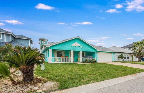 Safe Harbor House | Experience the Diving Dolphin: Oceanfront Bliss Awaits