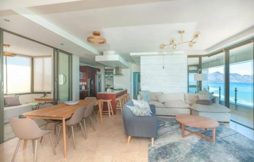 Strand Apartment | Oceanfront Designer Apartment with Sea and Mountain Views