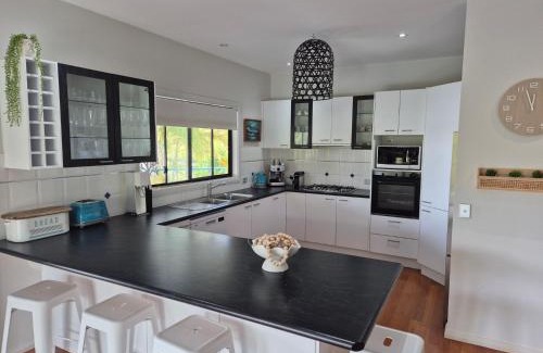Elizabeth Beach House | Sea Breeze: Family-Friendly Retreat with Pet Amenities