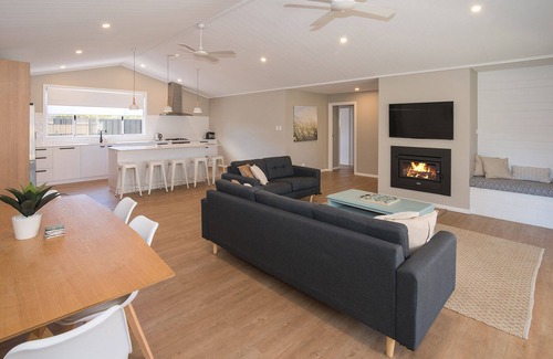 Broadwater House | Beachside Family Haven with Ocean View & Pool Access