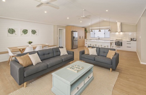 Broadwater House | Beachside Family Haven with Ocean View & Pool Access