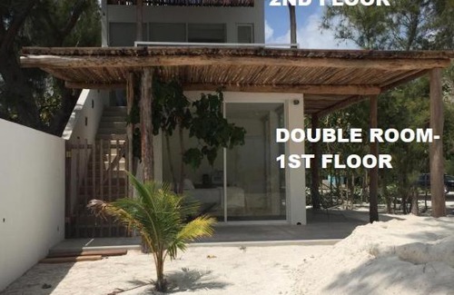 Punta Sam Apartment | Oceanfront Getaway at Sea by C Apartments - 4 Star Retreat