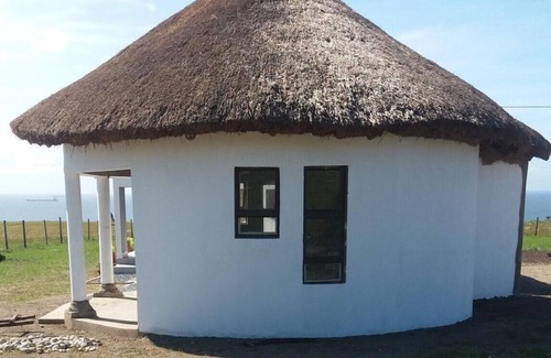 Ngquza Hill House | Tranquil Sea-Facing Retreat in Nature's Embrace