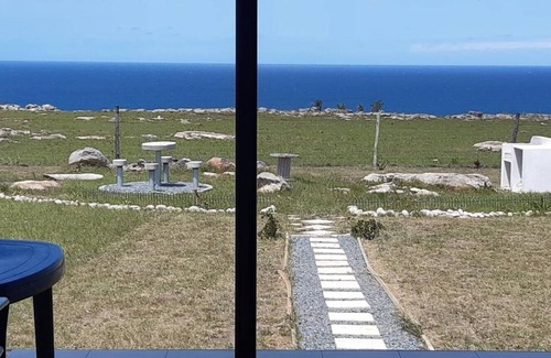 Ngquza Hill House | Tranquil Sea-Facing Retreat in Nature's Embrace