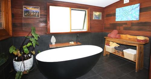 Corindi Beach Villa | Discover Sea Foam Cottage: 4-Star Getaway with High Ratings