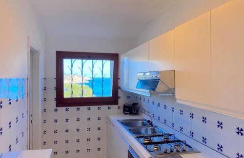 Porto Cervo Apartment | Oceanfront Sea Front Bonbonnière with Pet-Friendly Perks