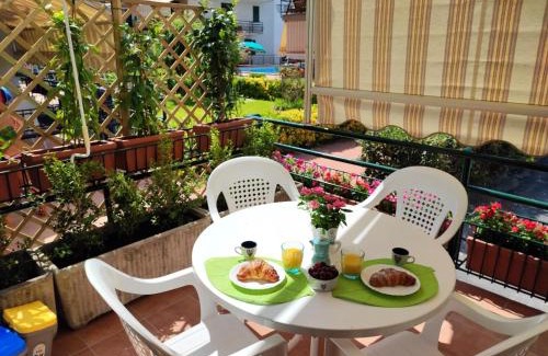 Sant'Anna Apartment | Sea Garden: Oceanfront Paradise with Pool & Pet-Friendly