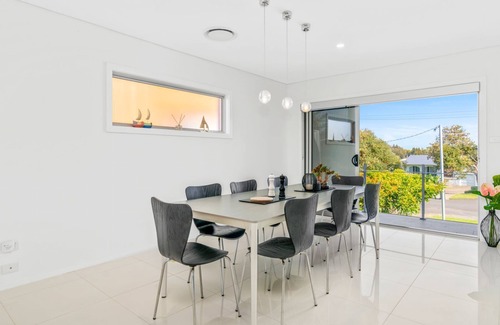 Culburra Beach House | Sea La Vie: Pet Friendly Retreat with Pool and Spa Access