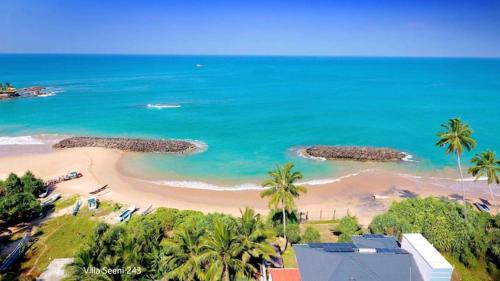 Hikkaduwa Villa | Oceanfront Retreat at Sea Shell Villa Hikkaduwa with Beach Access