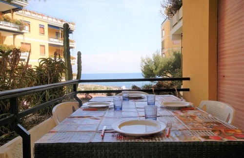 San Lorenzo al Mare Apartment | Scenic Sea View Apartment with Pool and Family-Friendly Amenities
