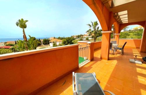 Los Puertos Apartment | Elegant Sea View Apartment with Garden at Mojon Hills