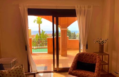 Los Puertos Apartment | Elegant Sea View Apartment with Garden at Mojon Hills