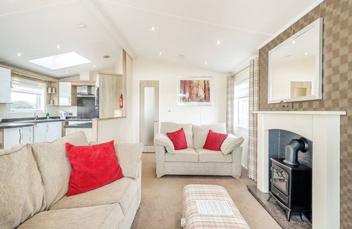 Kirkcudbright Ski Chalet | Modern Lodge with Sea Views, Pool & Family Amenities