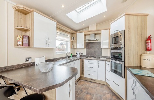 Kirkcudbright Ski Chalet | Modern Lodge with Sea Views, Pool & Family Amenities