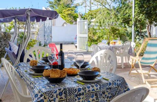 Torre Specchia Ruggeri House | Relax at Sea View Villa Scirocco, Steps from the Ocean
