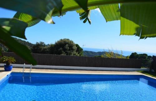 Sant Cebria de Vallalta Villa | Oceanfront Retreat: Pet Friendly with Scenic Pool & Nature