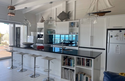 Waterhouse House | Relaxing Sea Views Steps from Hooper's Beach and Town Center