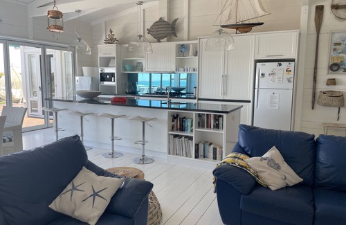 Waterhouse House | Relaxing Sea Views Steps from Hooper's Beach and Town Center