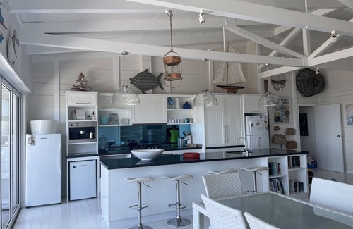 Waterhouse House | Relaxing Sea Views Steps from Hooper's Beach and Town Center