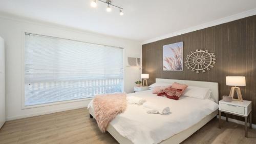 Point Clare House | Seabreeze Retreat: Oceanfront Getaway with Pet-Friendly Perks