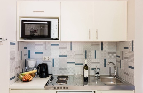 Agios Ioannis Apartment | Seadrop Suites: Guest Rated 10/10 with Pool & Breakfast
