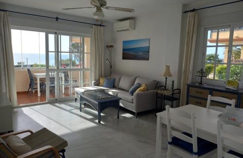 Torrox Costa Apartment | Seafront Retreat with Garden and Ocean Views Await You