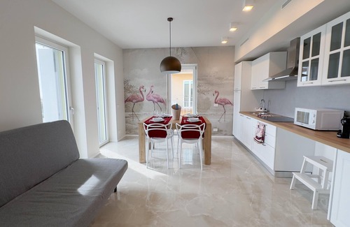 Chioggia Apartment | Seafront Modern Farmont Flamingo Suite with Breakfast & More