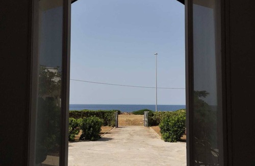 Capilungo Villa | Seafront Villa: Family-Friendly Retreat with Kitchen Access