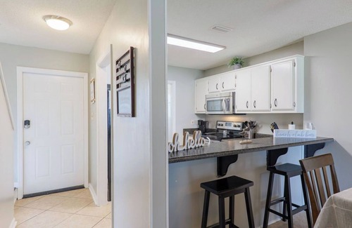 Lake Park Condo | Seas The Day with this cozy 2-bedroom lakefront condo.