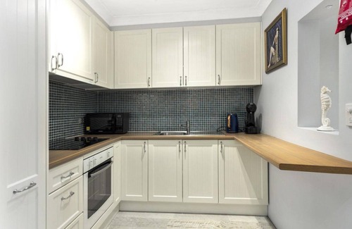 Ettalong Beach Apartment | Experience SEAS THE DREAM at Ettalong Beach with Ocean Views
